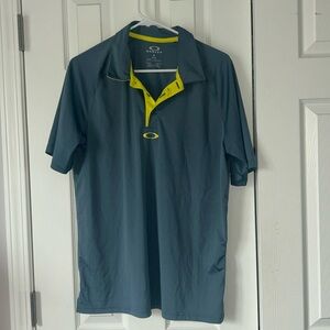 Oakley men’s medium golf shirt, dark bluish gray with yellow trim